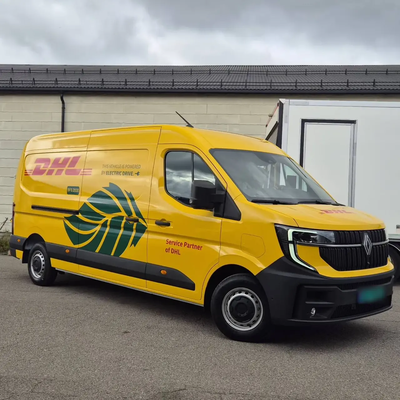 DHL service-partner van with fleet graphics