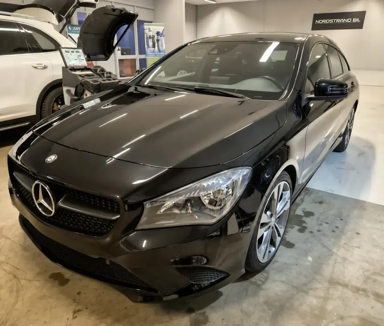 Black Mercedes CLA in the showroom