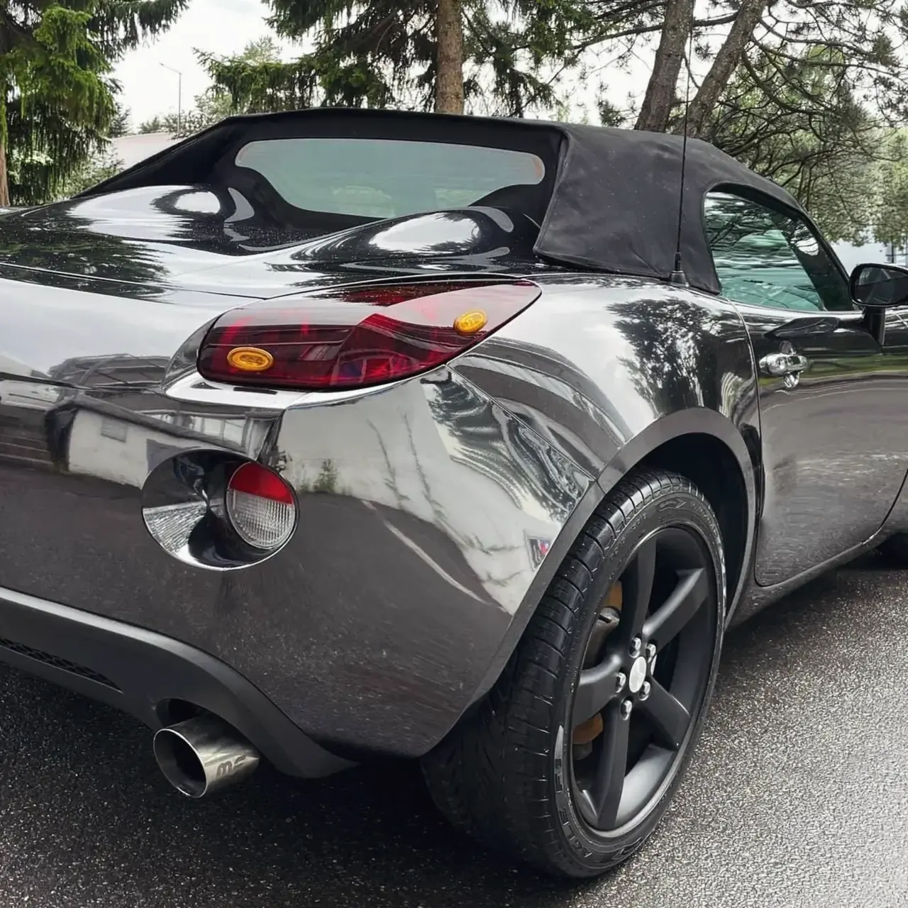 Deep gloss on a black Pontiac Solstice