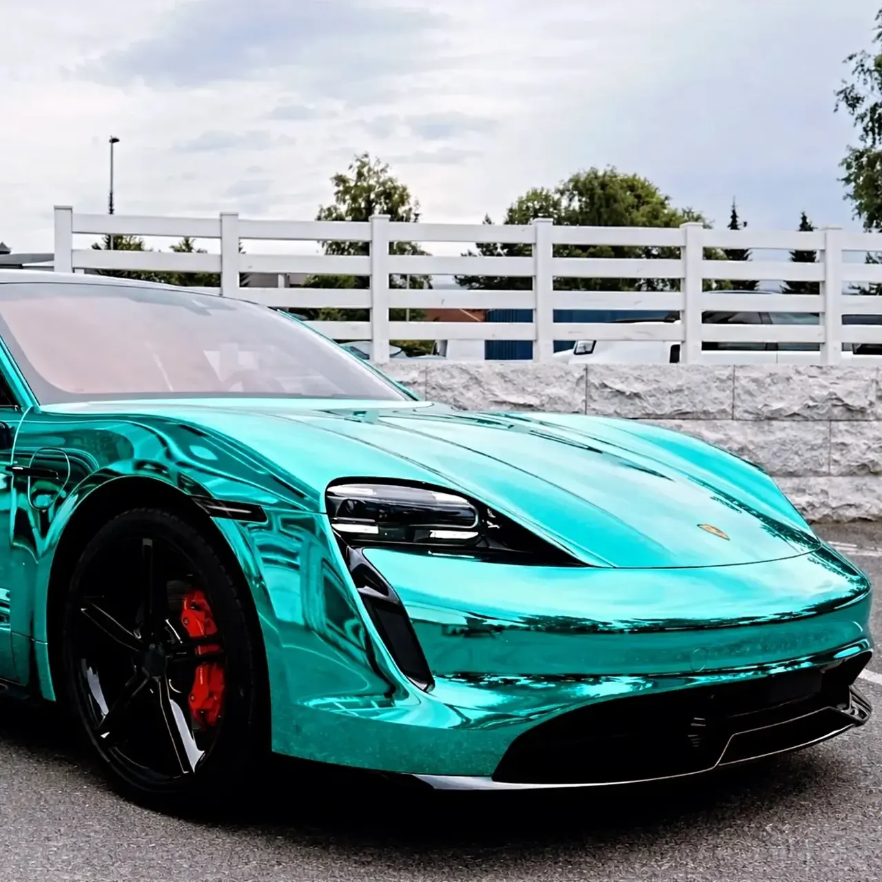 Porsche Taycan in teal chrome